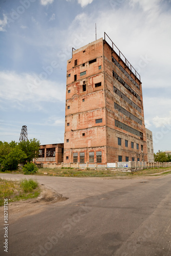 Abandoned building of an old factory on a sunny day