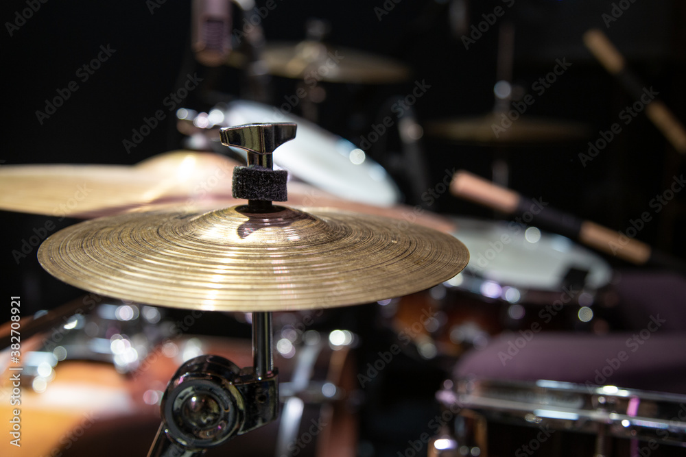 Cropped image of drum set. Drum kit with crash, ride, splash cymbal. Cropped image of drum set. Drum kit with crash, ride, splash cymbal.