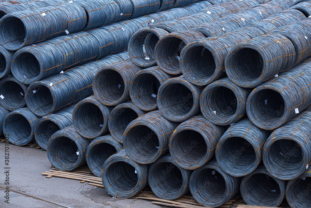 Steel low carbon wire rod, hot rolled steel drawing wire twelve millimeters or half an inch in diameter in coils. Freight transportation of heavy industry products by seaports. Export-import activity. Steel low carbon wire rod, hot rolled steel drawing wire twelve millimeters or half an inch in diameter in coils. Freight transportation of heavy industry products by seaports. Export-import activity.