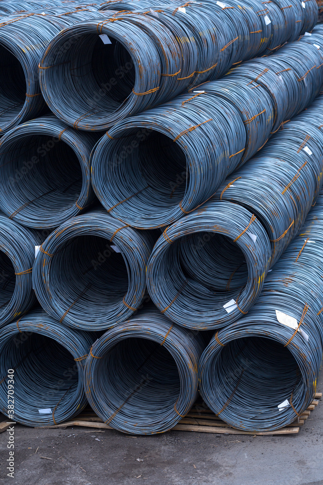 Steel low carbon wire rod, hot rolled steel drawing wire twelve millimeters or half an inch in diameter in coils. Freight transportation of heavy industry products by seaports. Export-import activity. Steel low carbon wire rod, hot rolled steel drawing wire twelve millimeters or half an inch in diameter in coils. Freight transportation of heavy industry products by seaports. Export-import activity.