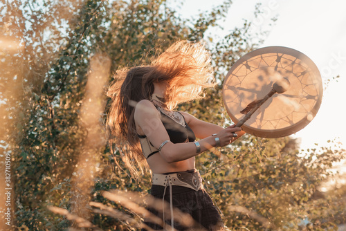 Evocation ritual of a young shaman tribal woman