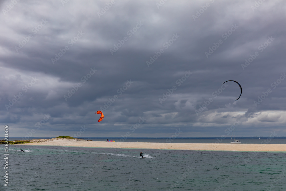 Kitesurfers in Glenan Islands, Finistere, Brittany, France