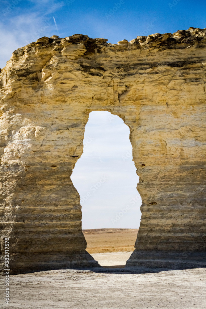 chalk rock formation with frame hole