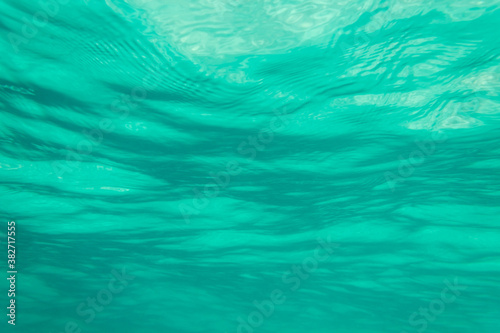 look at the waves from under the water, azure sea, use as a background or texture