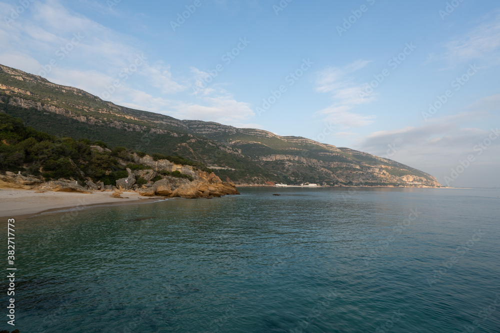 Paradise idylic Coelhos beach with turquoise water in Arrabida park, in Portugal Paradise idylic Coelhos beach with turquoise water in Arrabida park, in Portugal