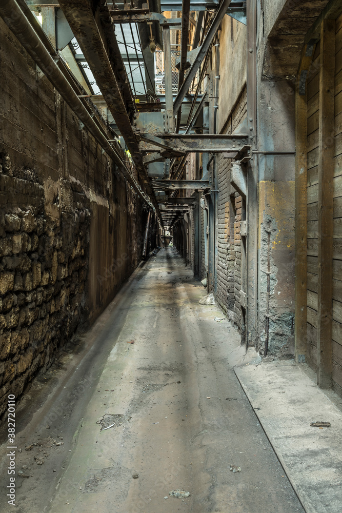 narrow aisle in a historic factory