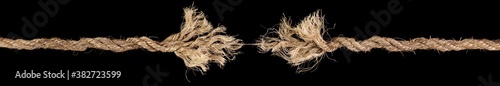 Rope frayed and ready to break apart with rope held together by a last strand ready to snap. Concept of dangerous stress or stressful situation like divorce separation, deadlines, failure, or tension.