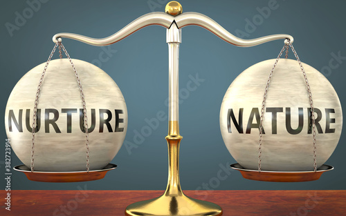 Valokuva nurture and nature staying in balance - pictured as a metal scale with weights a