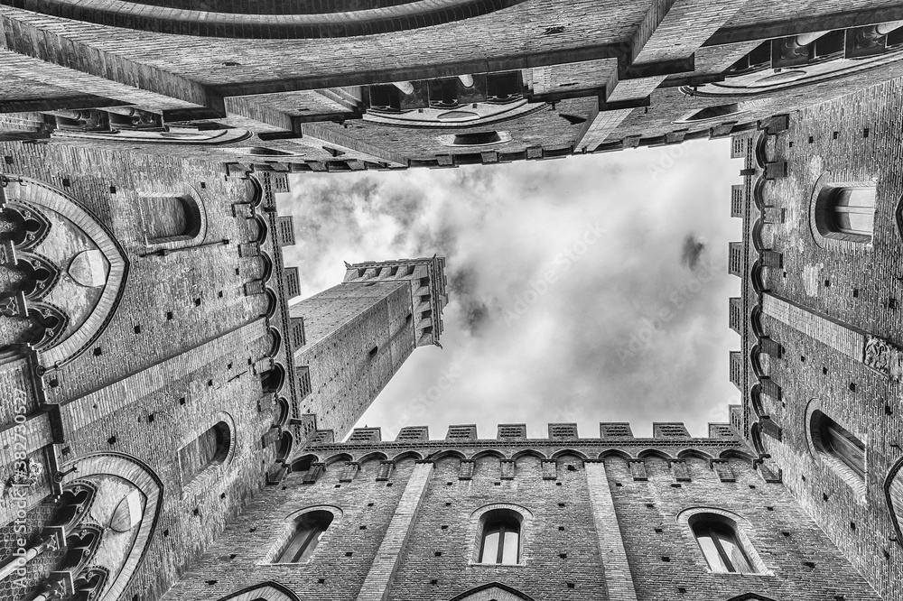 Fototapeta premium View from the bottom, patio of Palazzo Pubblico, Siena, Italy