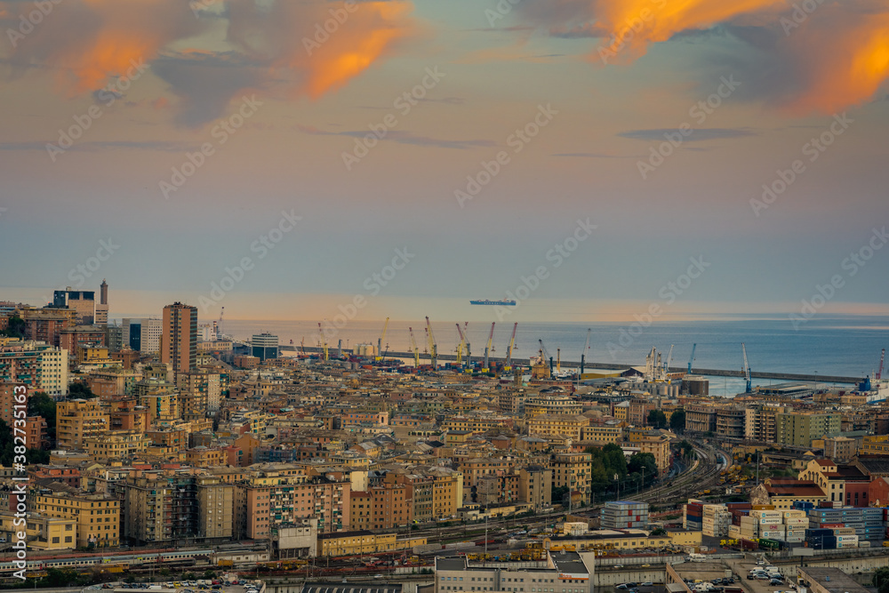 Genoa, Italy - 09 15 2020: Aerial view of the harbor at sunset. Time lapse. 