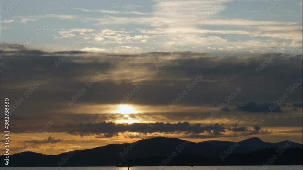 Wide, timelapse, golden cloudscape at sunset, Vancouver, Canada Wide, timelapse, golden cloudscape at sunset, Vancouver, Canada