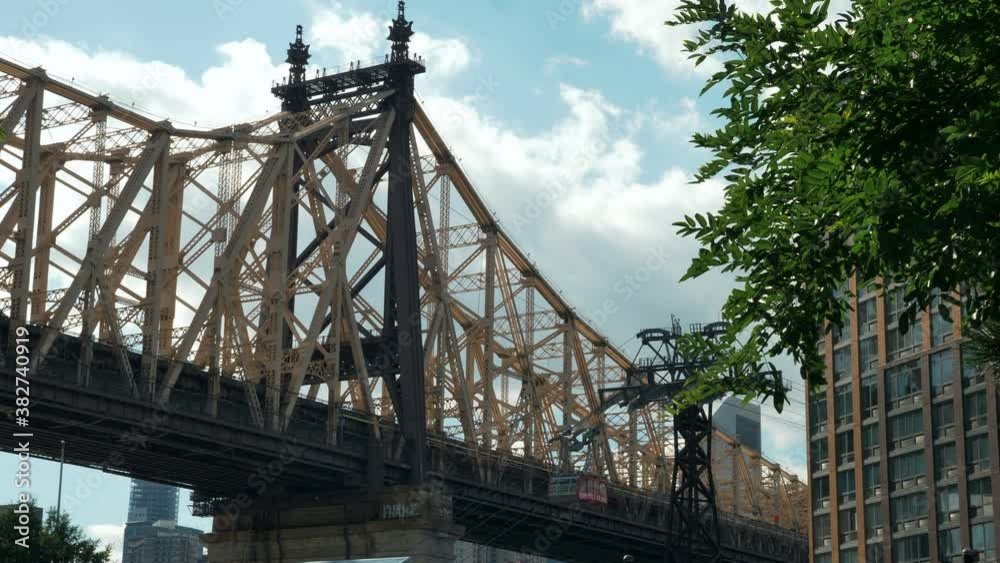 Close-up, Ed Koch Queensboro Bridge and a descending cable car, New York, USA Close-up, Ed Koch Queensboro Bridge and a descending cable car, New York, USA