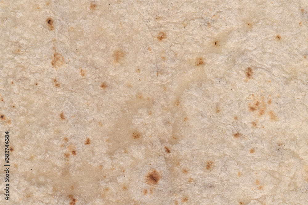 Tortilla mexican food texture in white background. Wrap texture