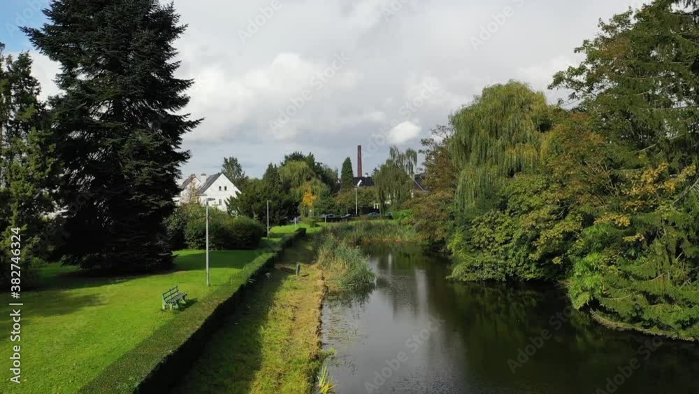 Aerial, pov, a canal in a public park, Gent, Belgium Aerial, pov, a canal in a public park, Gent, Belgium