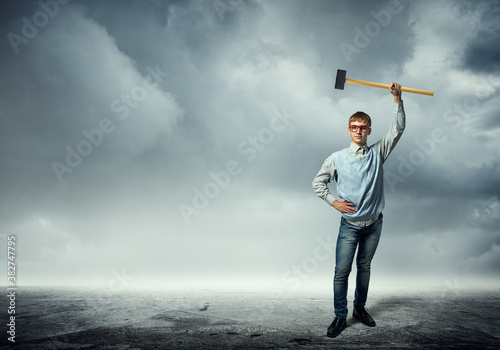 Boy holding hammer © adam121