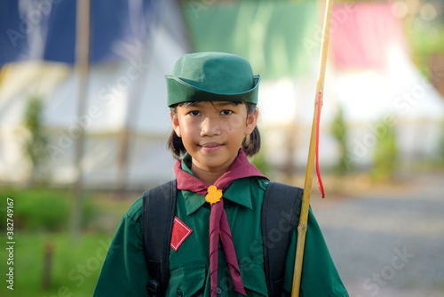 Asian women scout children in Thailand Wearing a girl scout uniform photo