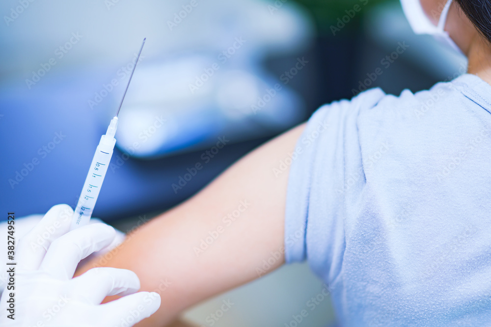 corona virus vaccine injection to young woman corona virus vaccine injection to young woman