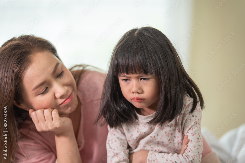 Mother tries reconciling with daughter after quarre, family fight concept, generation gap concept Mother tries reconciling with daughter after quarre, family fight concept, generation gap concept
