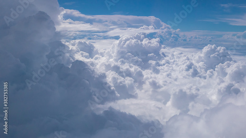 The cloudscape of beautiful cloud in the sky background view from airplane.