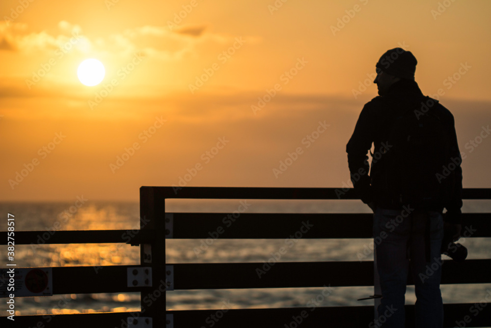 Photographer at sunrise