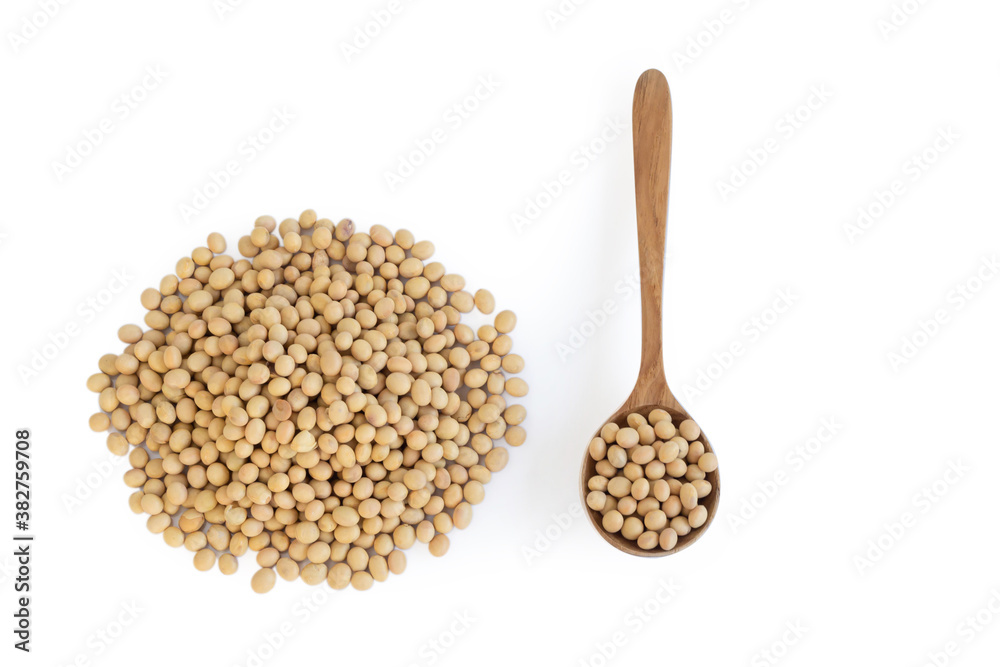 Soy beans in wooden spoon isolated on white backgroun, health care concept Soy beans in wooden spoon isolated on white backgroun, health care concept