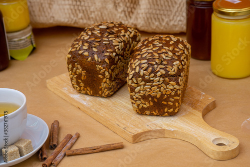 Grain baked brean on wooden board  photo