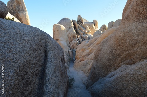 Afternoon tight hike in dramatic rock formation in Joshua Tree National Park
