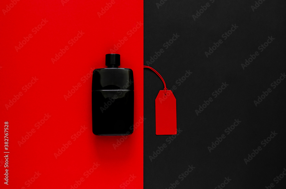 Red price tags with discount merchandise on red and black background. Black Friday concept.
