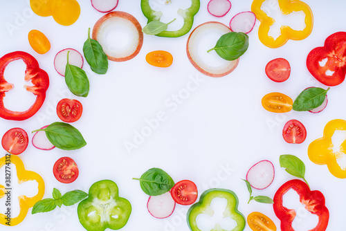 sliced vegetables pattern for cooking design on white background top view flat lay.