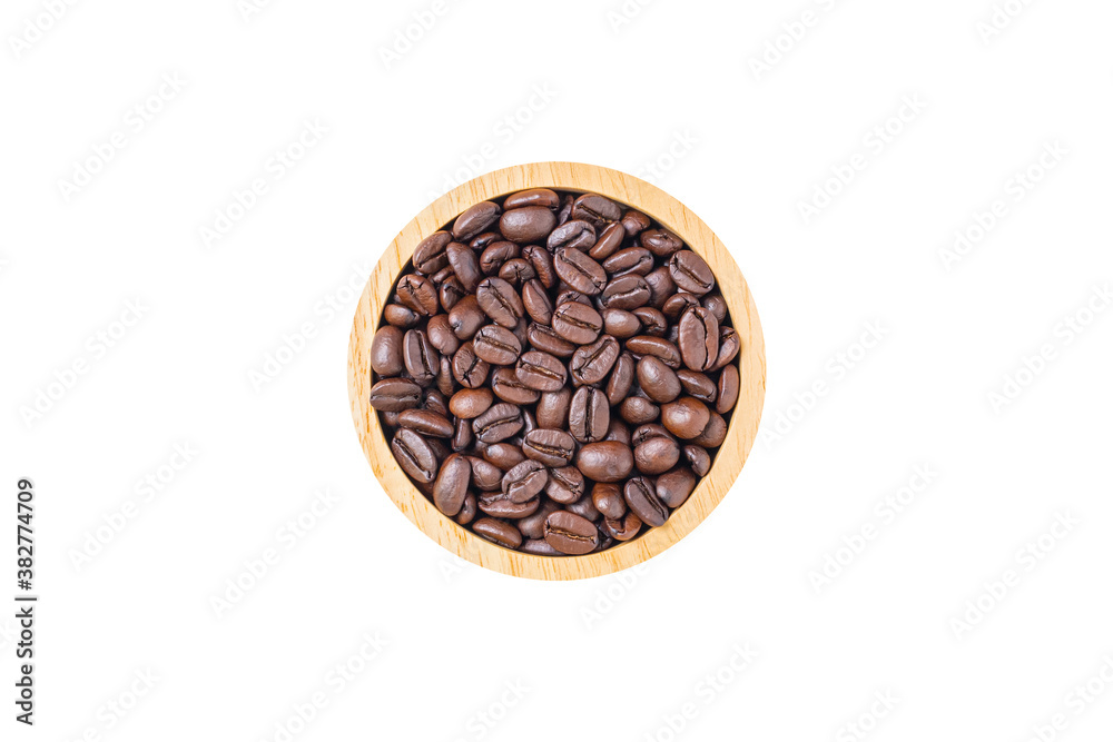 Coffee beans roasted in a wooden bowl isolated on white background. Top view.