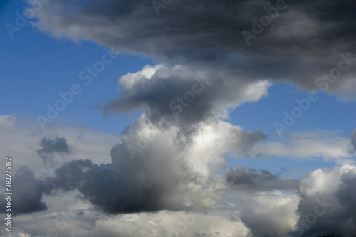 Dramatic panoramic skyscape with dark stormy clouds