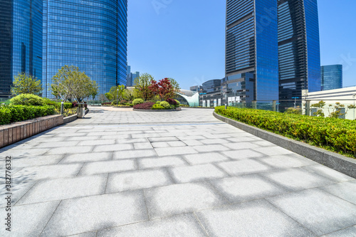 modern buildings and empty pavement in china. © hallojulie