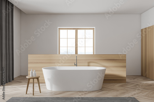 Modern white and wooden bathroom interior with tub