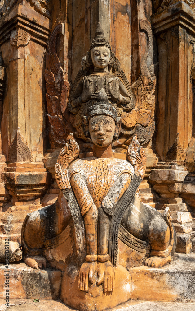 Ancient guardian statue at pagoda field in Sagar