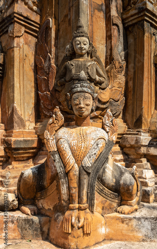 Ancient guardian statue at pagoda field in Sagar