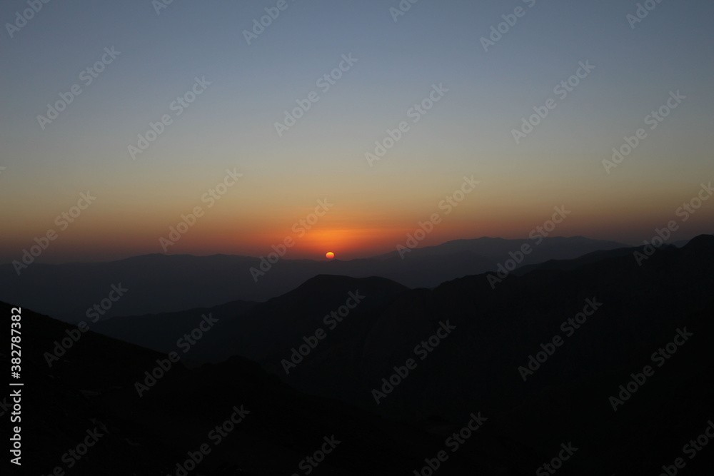 Fototapeta premium sunset over the mountains