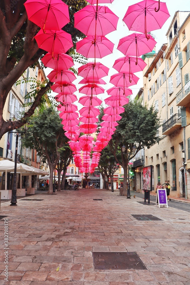 umbrella in downtown Grasse - obrazy, fototapety, plakaty 