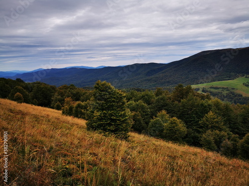 Carpathians European Mountains. Autumn colors of the mountains. Cloudy sky.Mountains in autumn.
