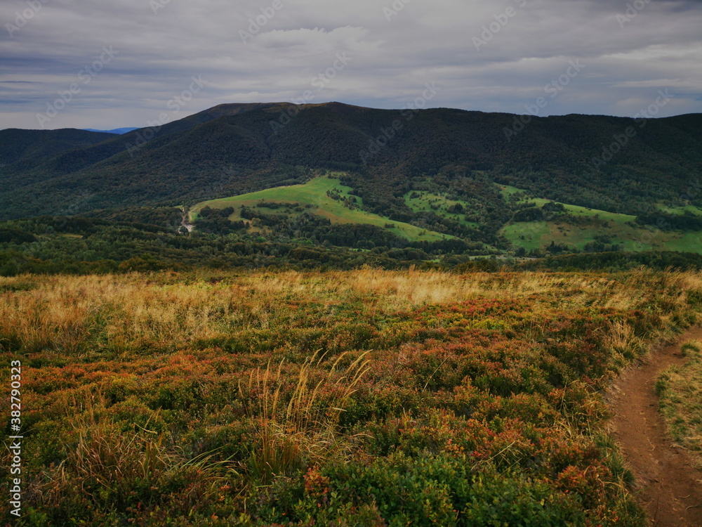 Bieszczady Poland. Autumn colors of the mountains. Cloudy sky. Active weekend.