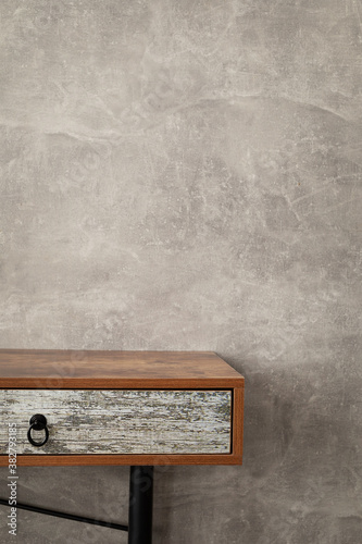 wooden shelf at grey background