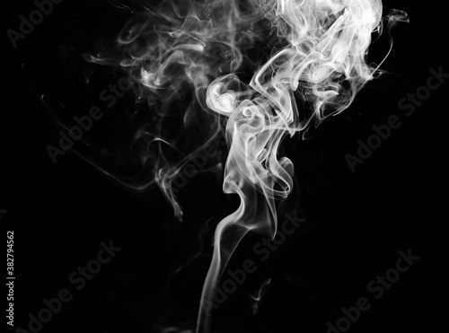 Fototapeta Naklejka Na Ścianę i Meble -  abstract fragment movement of white smoke on black background.