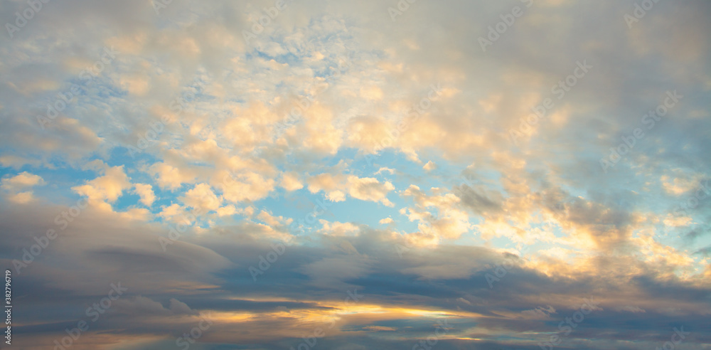 Beautiful sky. Panorama skyline with clouds and sun