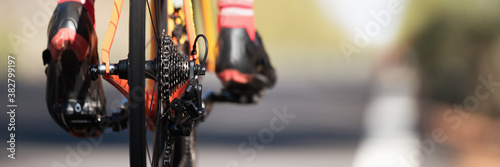 Racing - bike detail on gear wheels and feet
