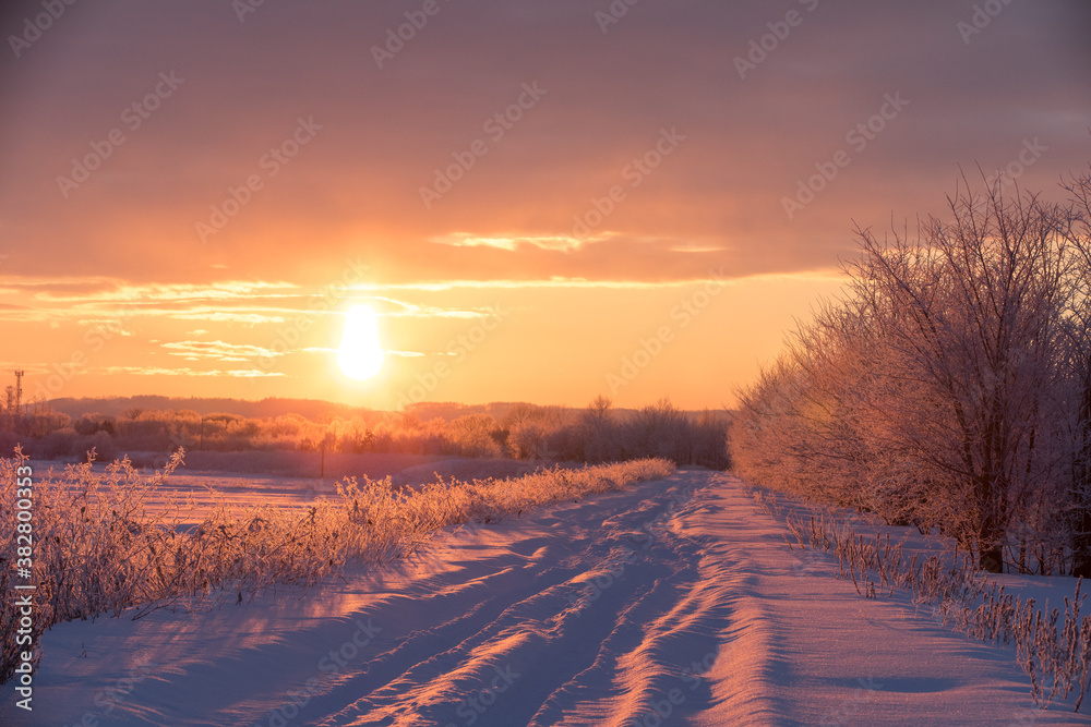 Severe winter morning with sun pillar