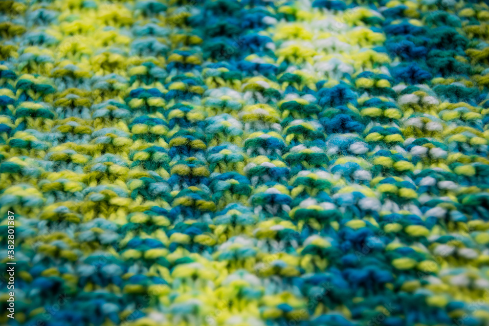 The structure of a colorful knitted scarf