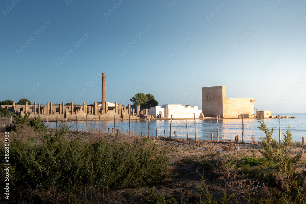 Shot of the ruins of the ancient building Tonnara di Vendicari. The building was used in the past as a workplace for tuna fishing. The place is now abandoned and it is a naturale reservation place