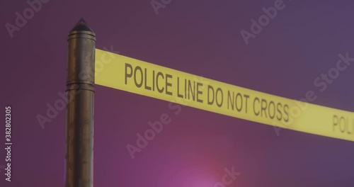 Police tape is blocking the way.
