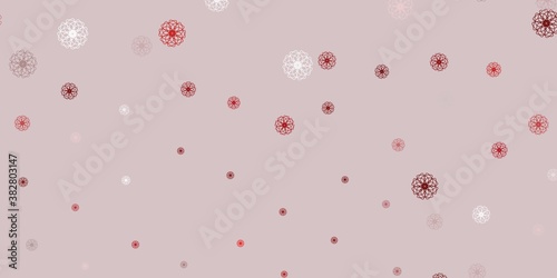 Light red vector doodle background with flowers.