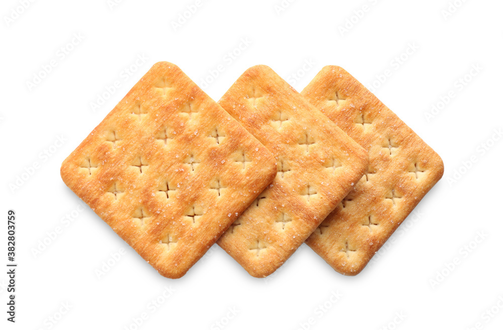 Delicious crispy crackers isolated on white, top view Delicious crispy crackers isolated on white, top view