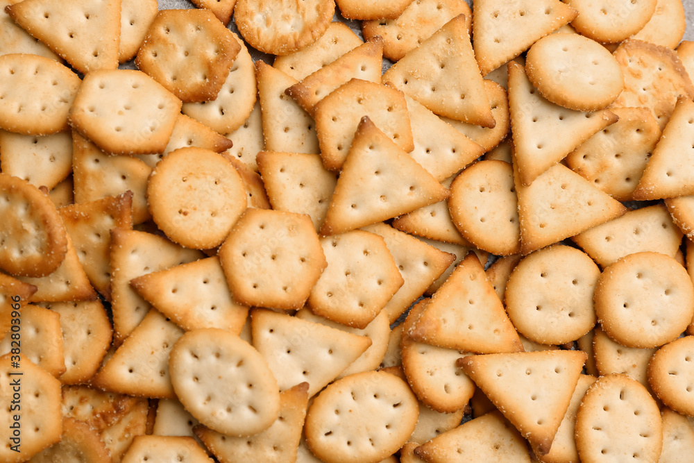 Many delicious crackers as background, top view Many delicious crackers as background, top view
